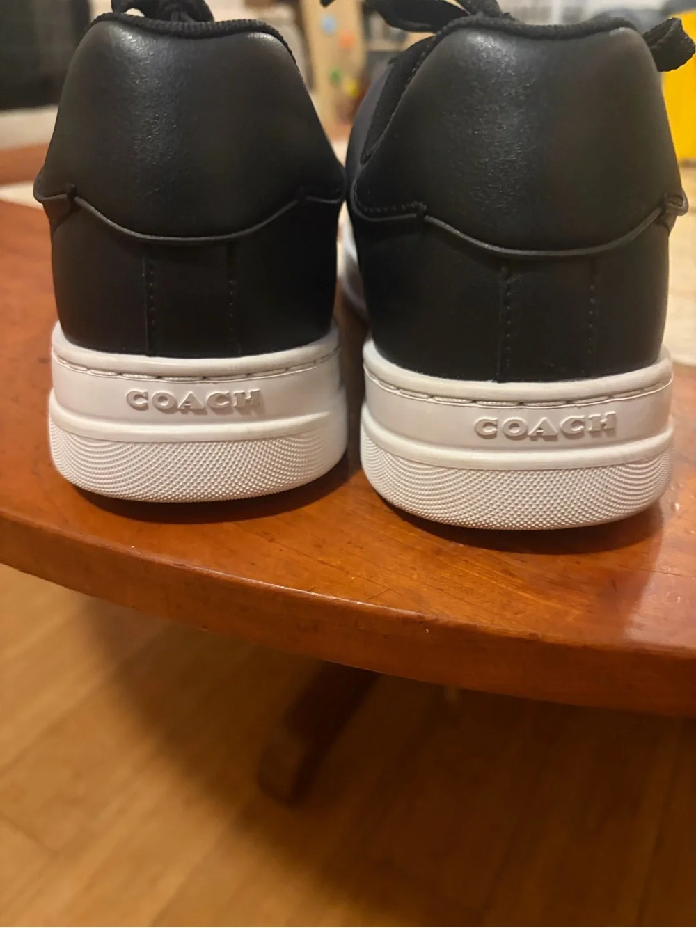 Coach Black Leather Low-Top Sneakers with Gold Logo